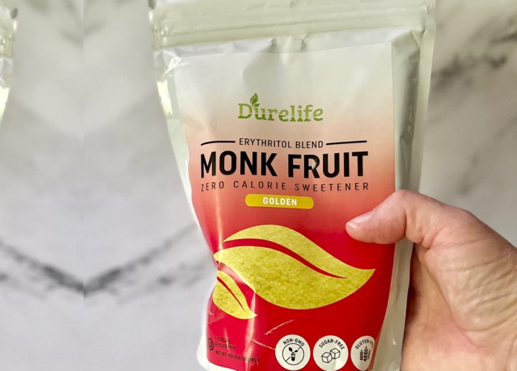 hand holding bag of monk fruit sweetener