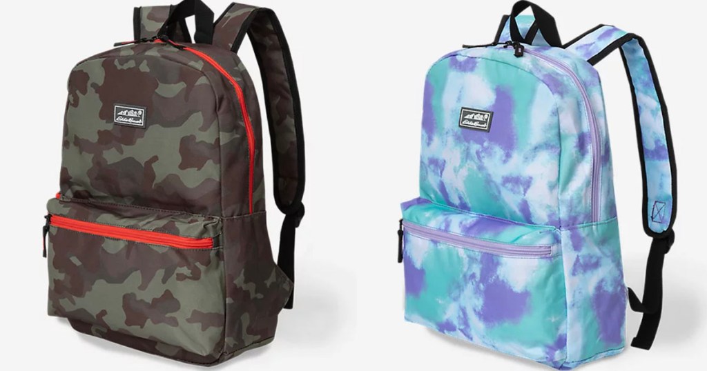 two small backpacks camo and blue/green tye dye stock images