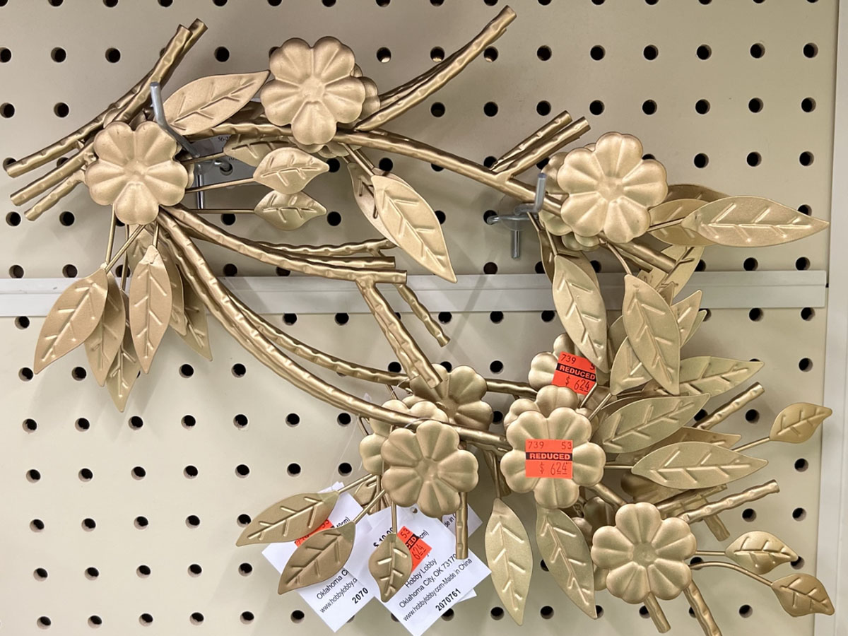 gold floral and leaf wall decor 