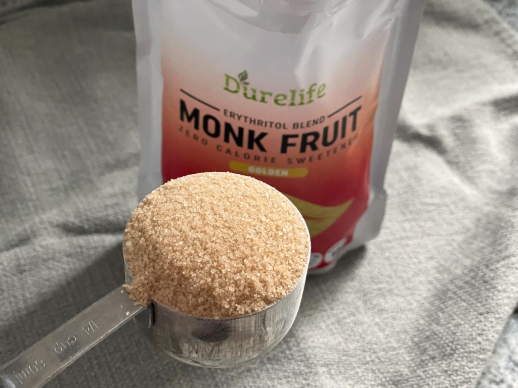 hand holding bag of monk fruit sweetener