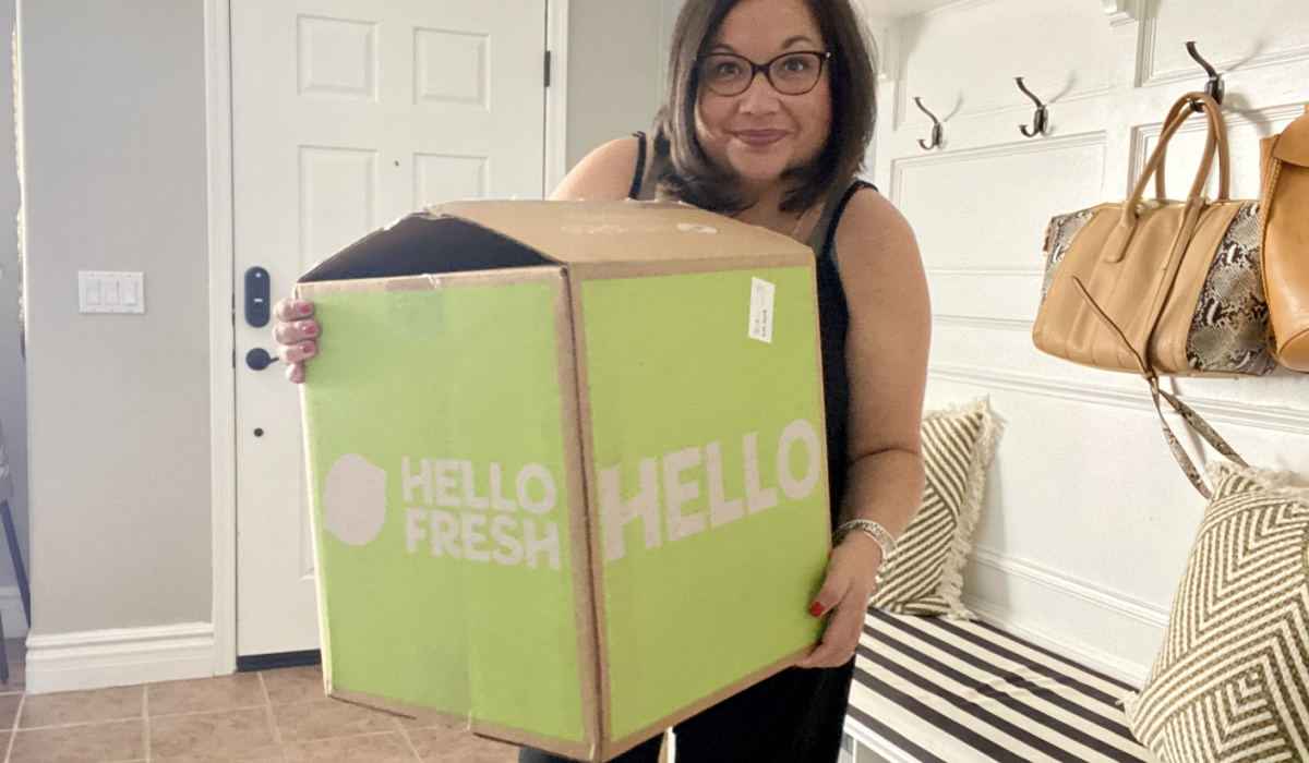 woman holding hello fresh box