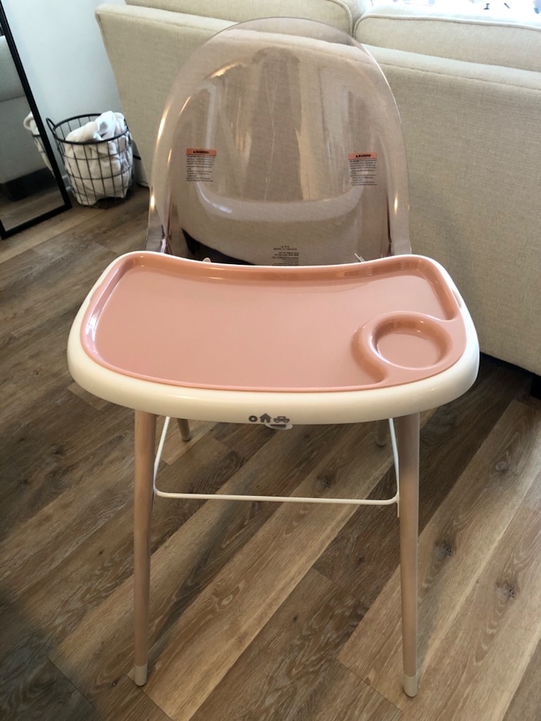 high chair with pink tray