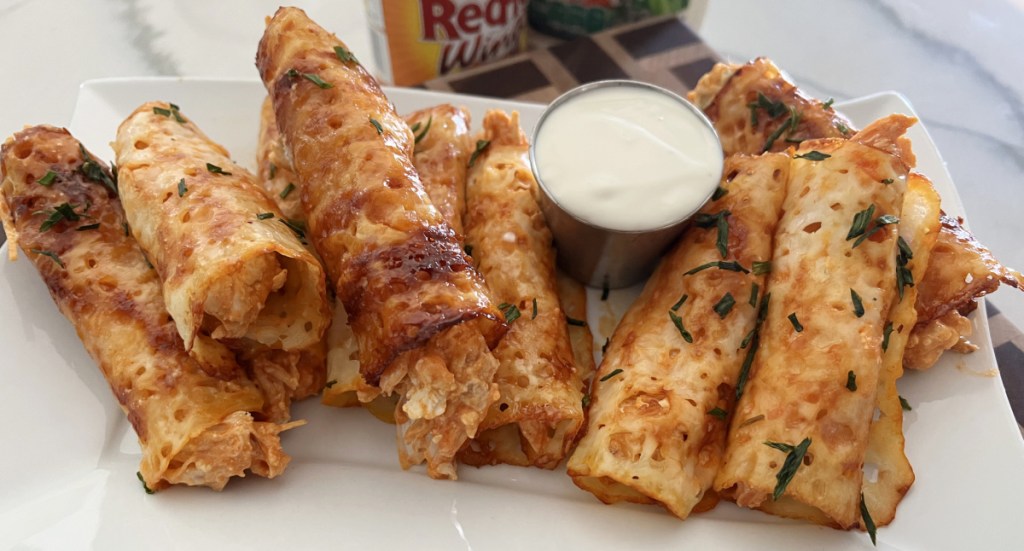 a plate of keto buffalo chicken rollups which make a great Gameday recipe to serve at a football party