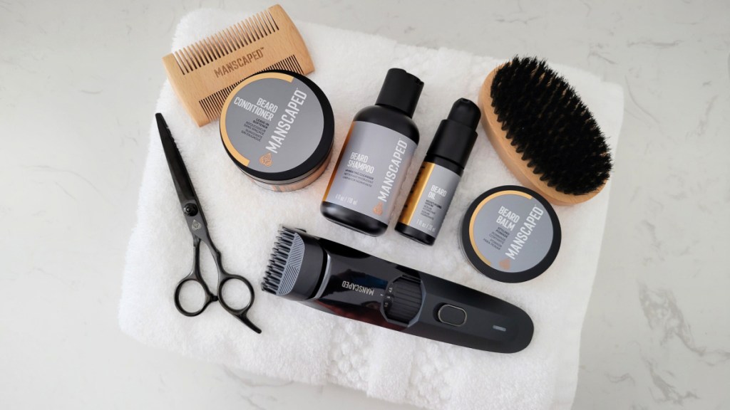 manscaped grooming items laid out on a white towel