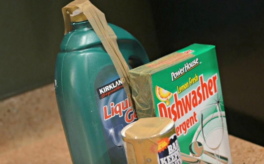 cleaning products with packing tape on openings