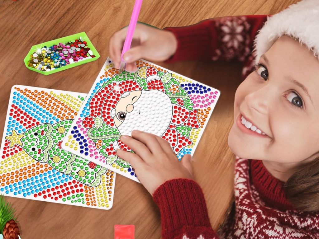 A child playing with a pigipigi Christmas Craft