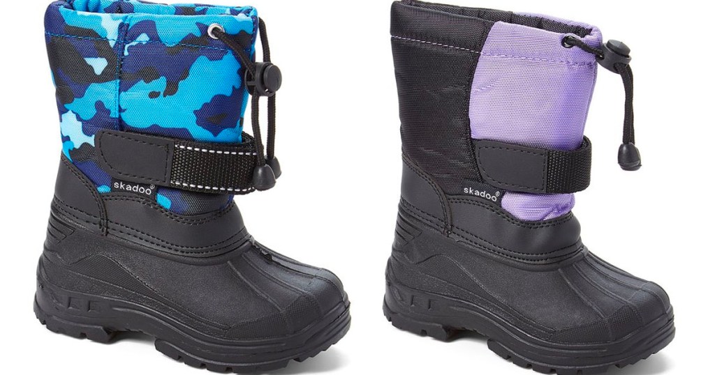 toddler blue camo and purple snow boot stock images