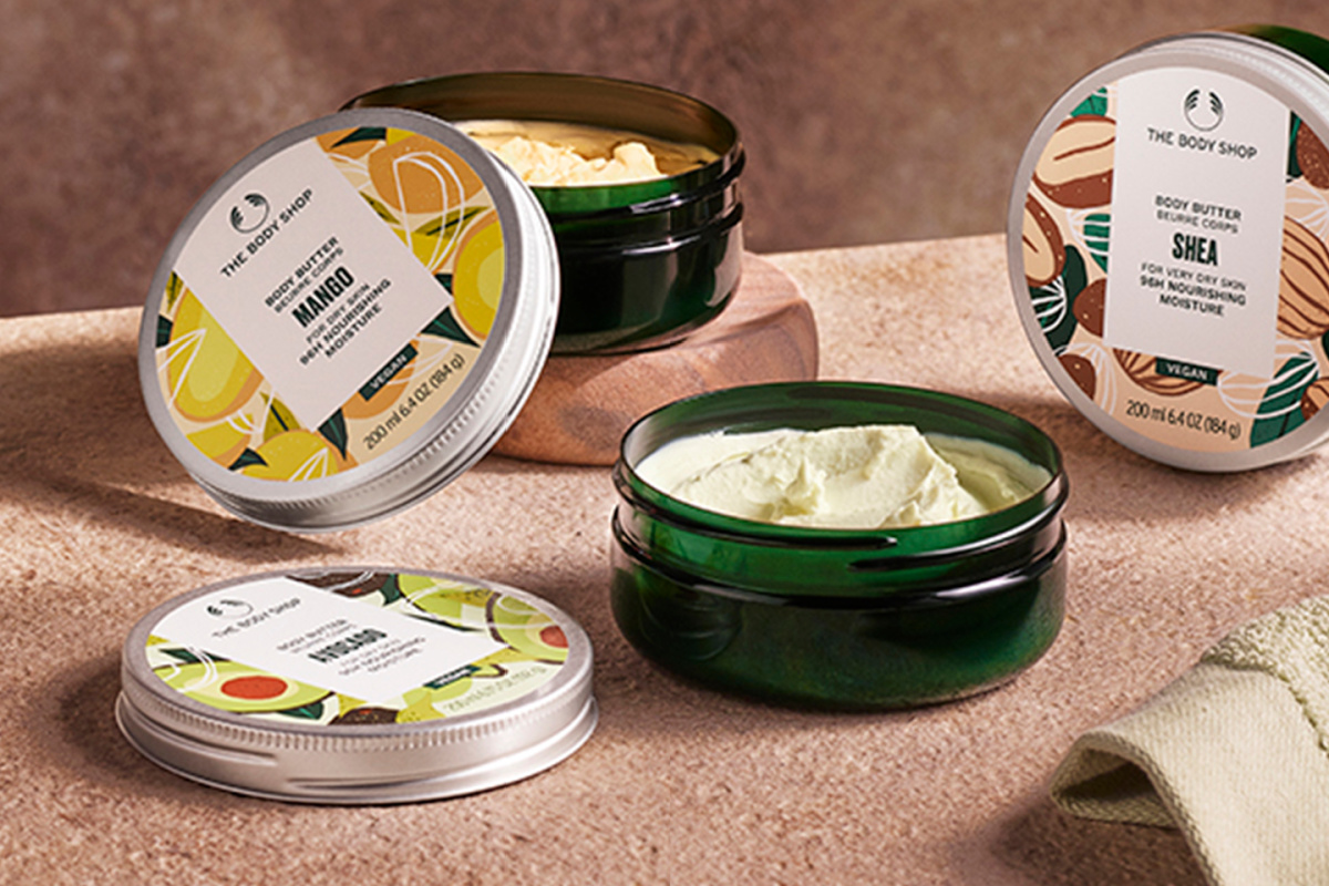 3 opened tins of body butter