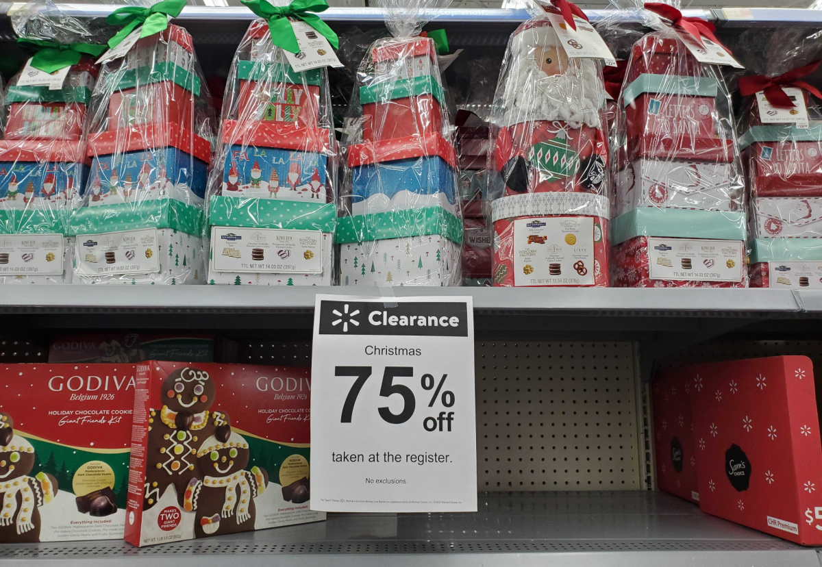 gift sets with a walmart christmas clearance sign on the shelf