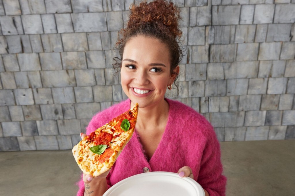 woman eating pizza 