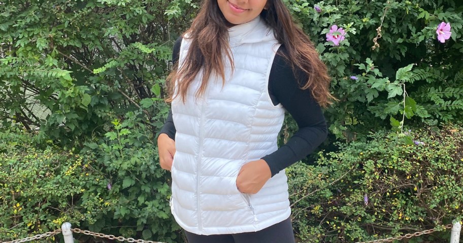 woman wearing white vest