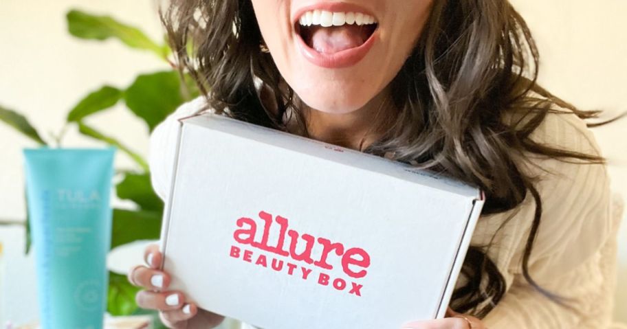A woman holding an attractive beauty box