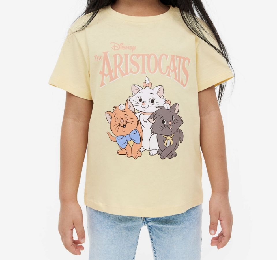Girl wearing an Aristocats shirt