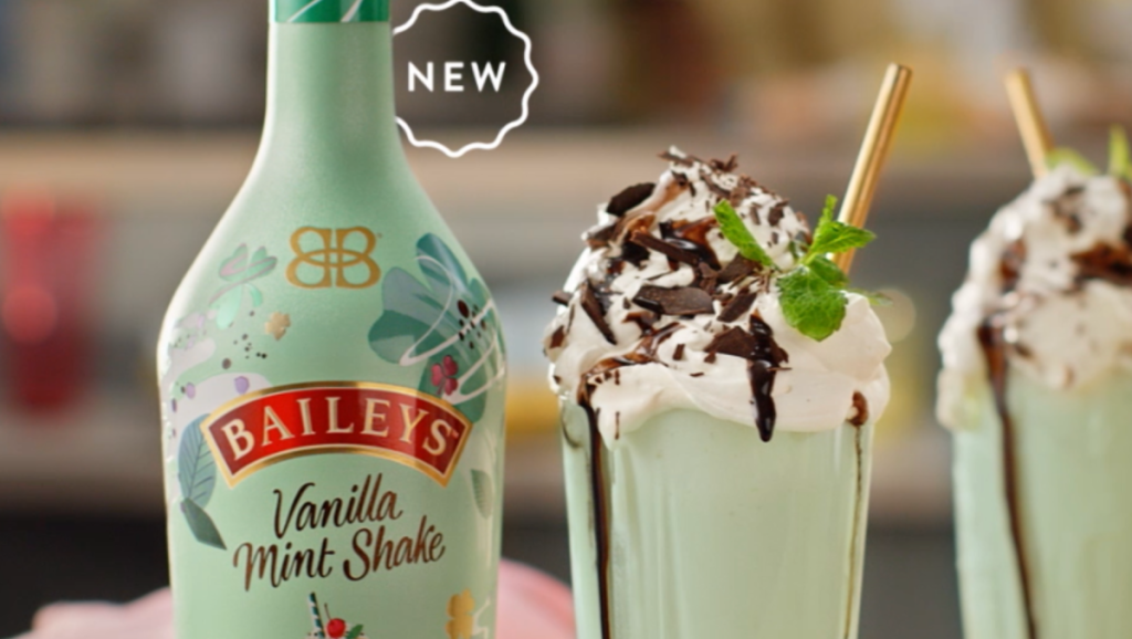 A bottle of Baileys Vanilla Mint Shake next to a Vanilla Mint Shake Milkshake