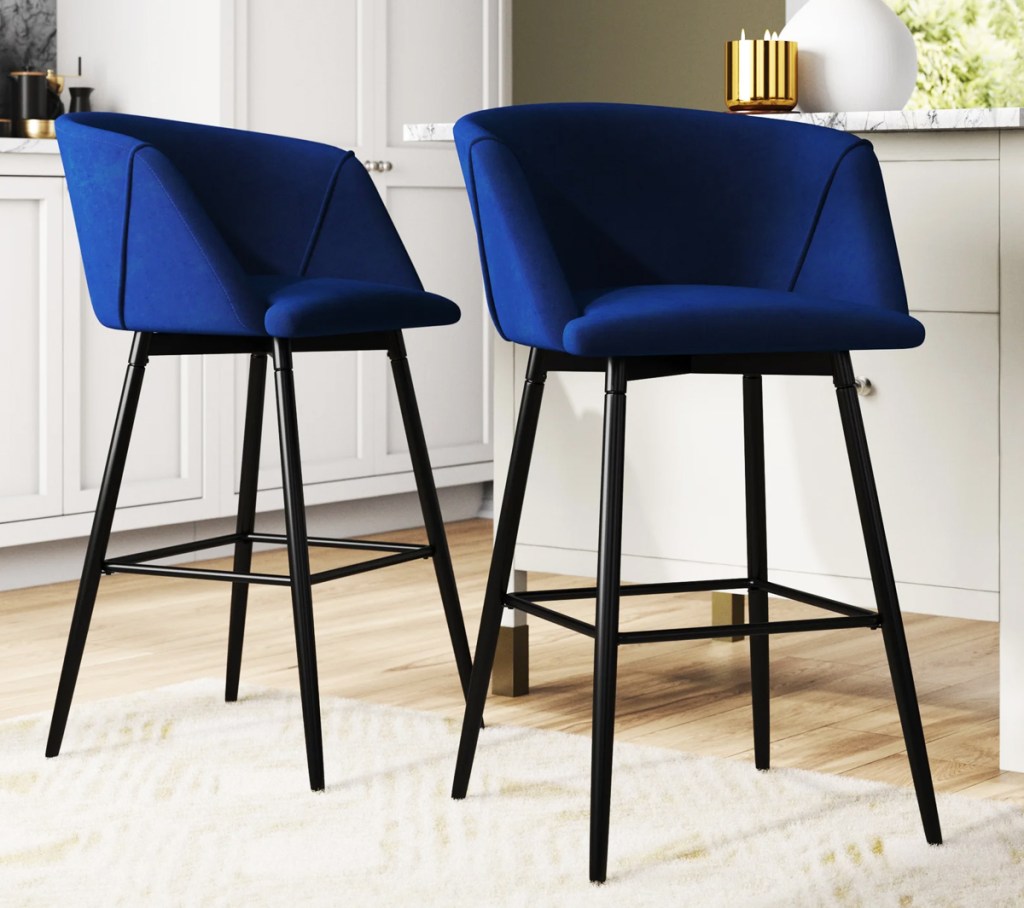 blue upholstered bar stools in kitchen