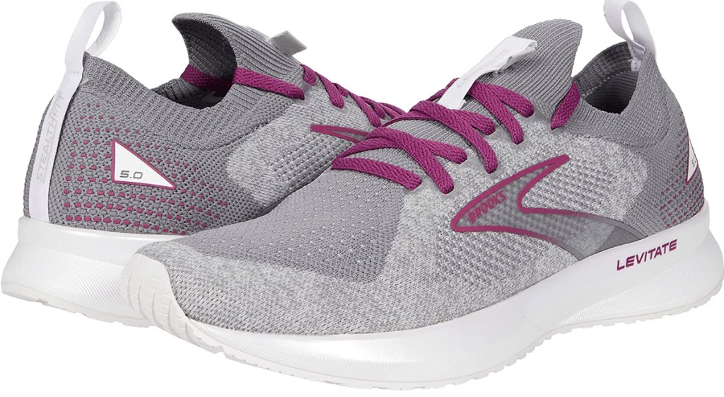pair of grey and purple brooks running shoes