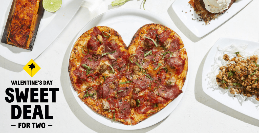 california pizza kitchen sweet deal for two heart-shaped pizza on a plate with side dishes