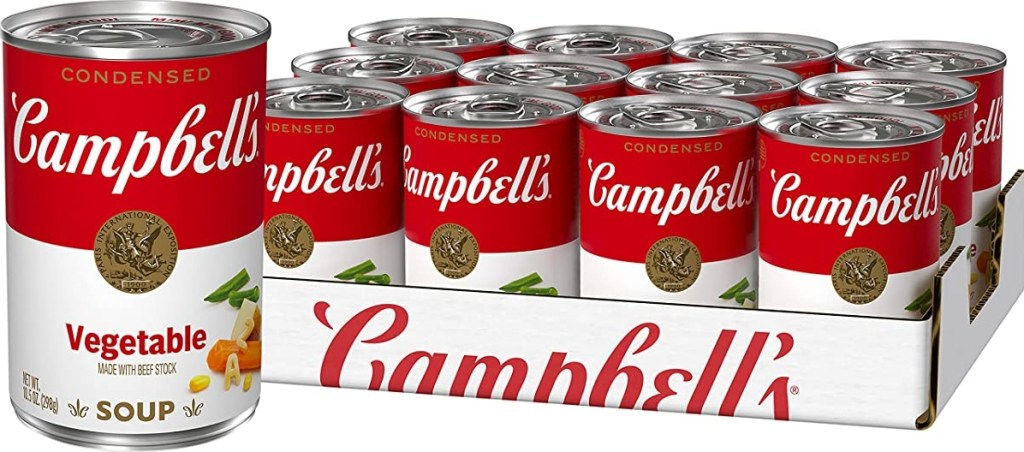 Pack of Campbell's soup cans with one can in front of the pack