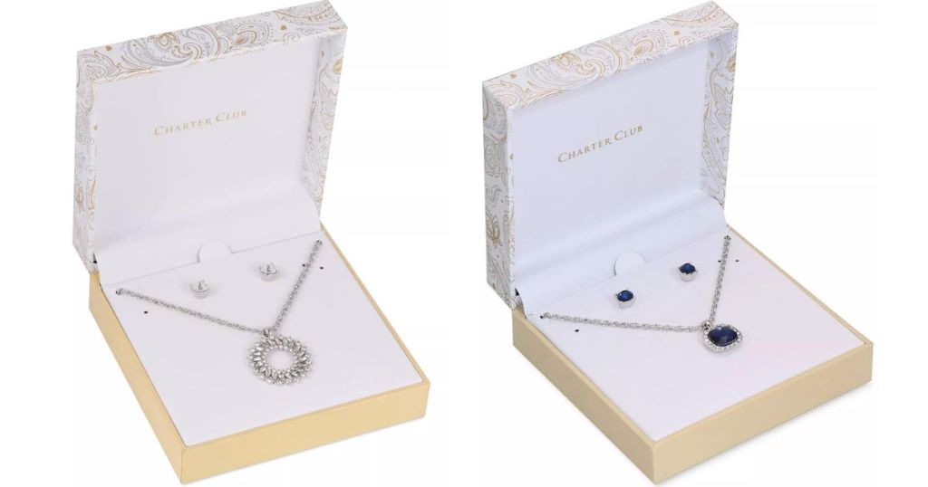 Two gift boxes each with a necklace and earrings