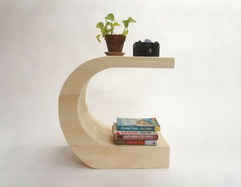 A crescent side table from OwlDesigned, one of the top Black Owned Etsy Shops and Businesses