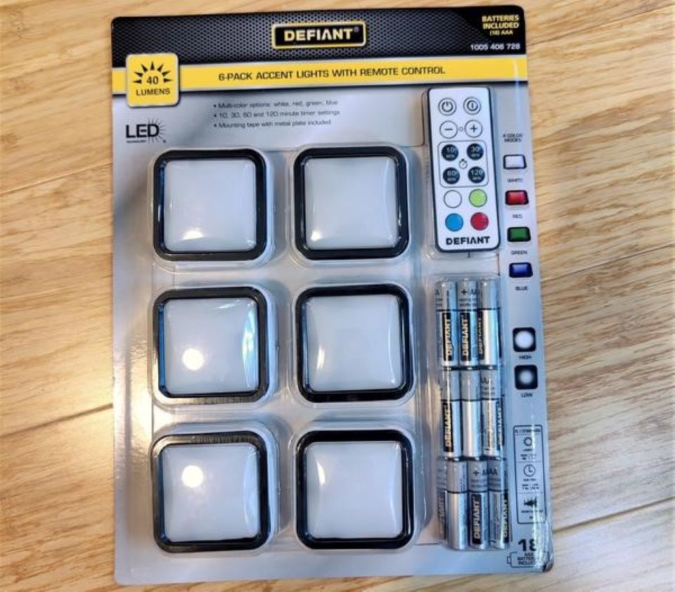 Pack of small lights with batteries and a remote.