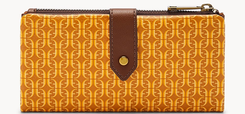 Fossil clutch with yellow and orange Fossil logo design printed on it and a brown clasp