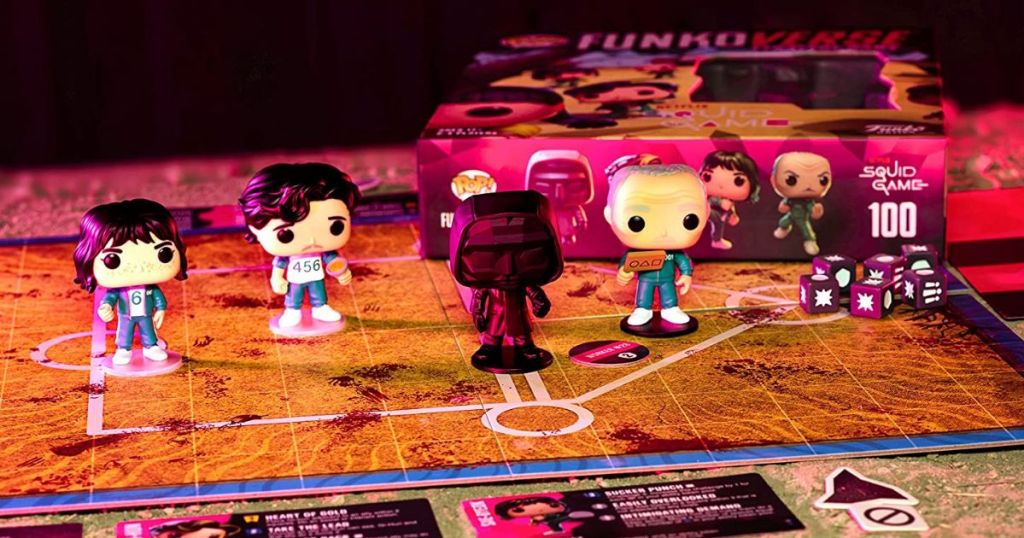 Close up of the four figurines that come with the Funkoverse Squid Game Strategy Game