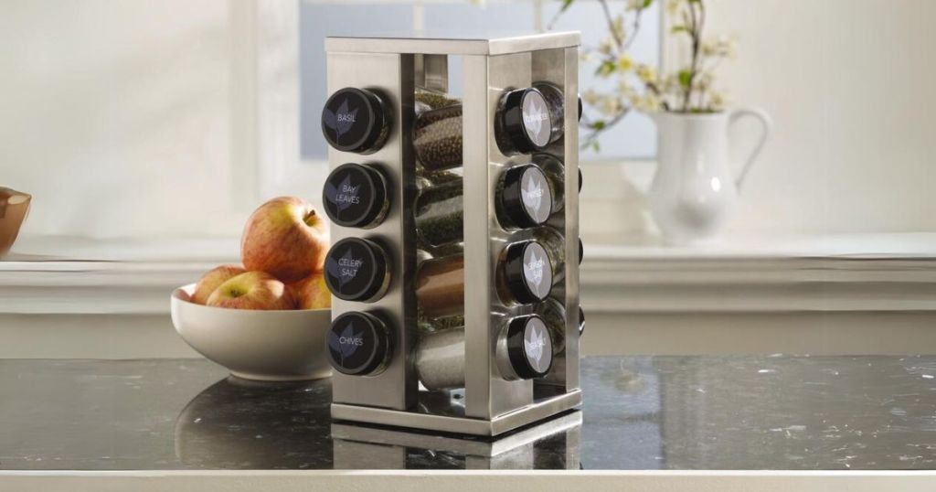 Kamenstein stainless steel revolving spice rack with spice jars on counter