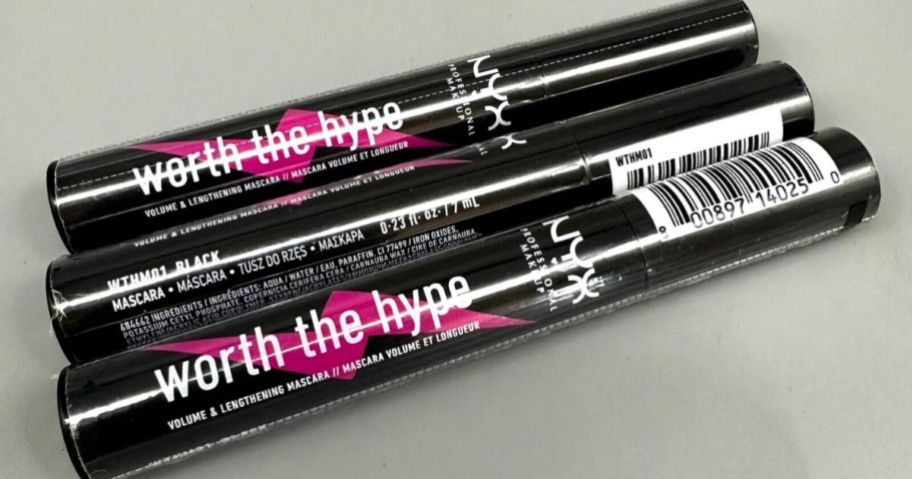 3 tubes of NYX Professional Worth the Hype Mascara laying on table