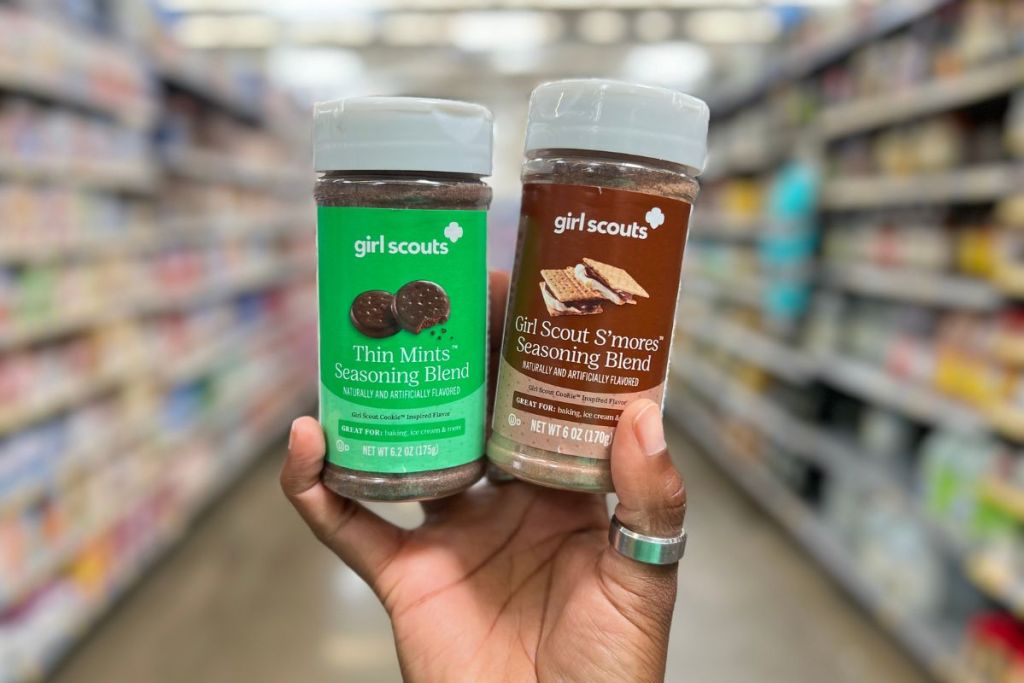 Girl Scout Seasoning Blends in woman's hand in store aisle
