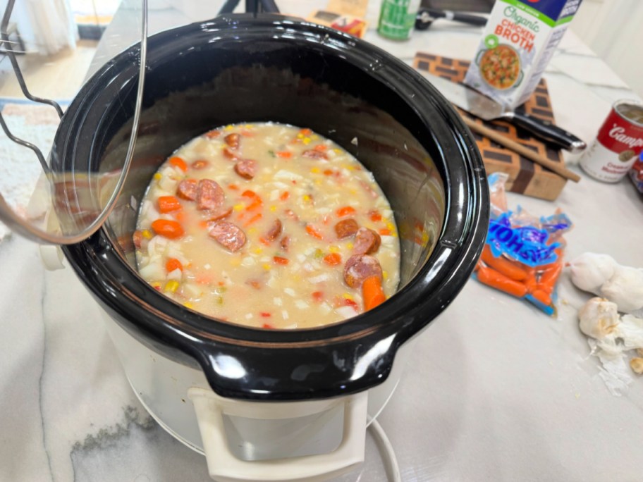 crock-pot with sausage corn chowder soup 
