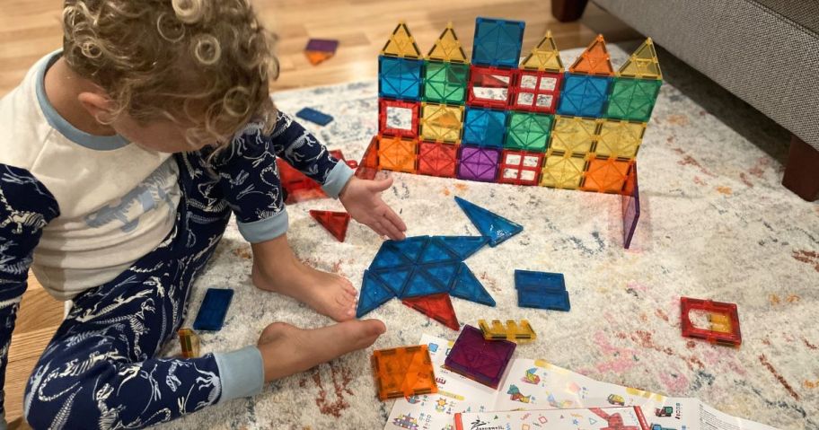 Little boy playing with a Jasonwell Magnetic Tiles Set
