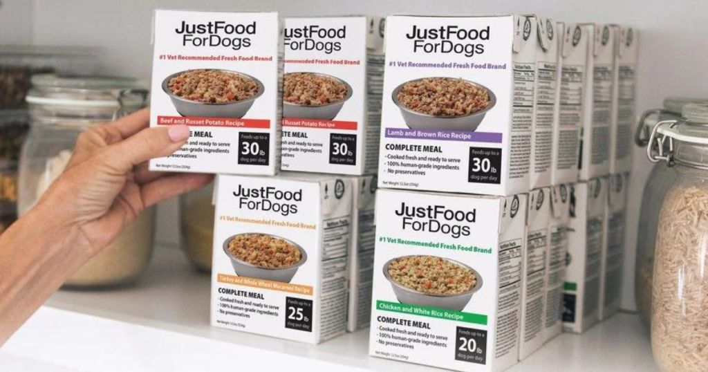 hand reaching into a pantry for dog food