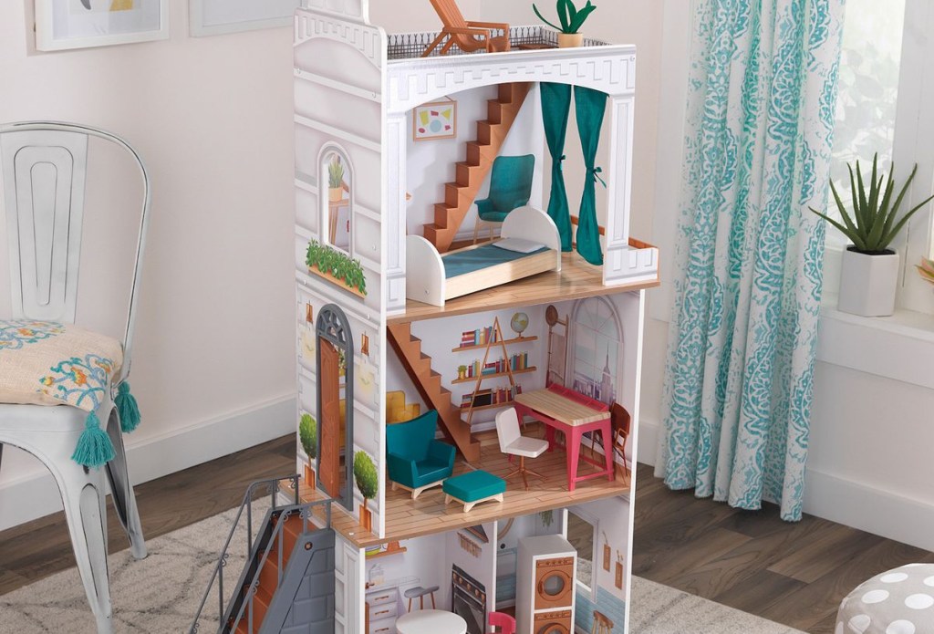 KidKraft Rowan Dollhouse with furniture in kids bedroom