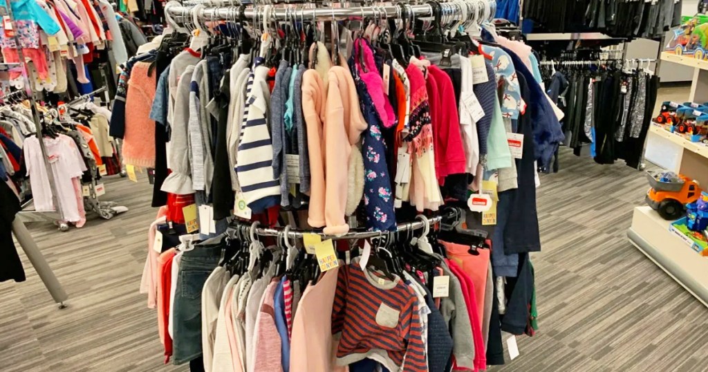 round rack of kids clothes in store