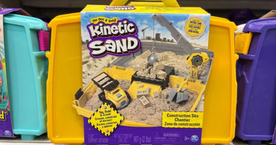yellow Kinetic Sand Construction Site Kit box on a store shelf
