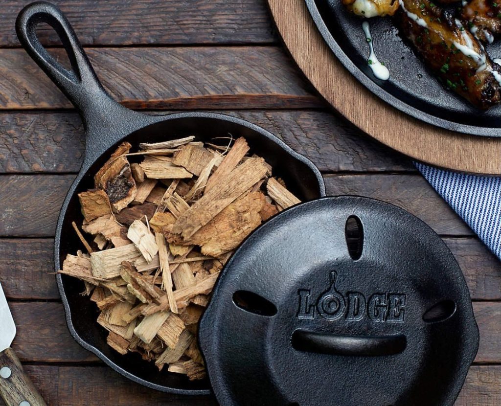 Lodge Cast Iron Smoker filled with wood chips