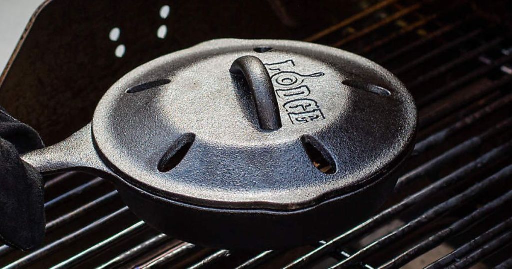 Lodge Cast Iron Smoker with cover on grill grates