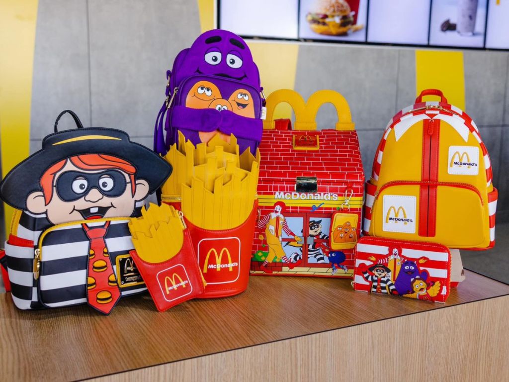 McDonald's Loungefly with backpacks, purses, and a wallet that look like McDonald's fries, Happy Meal, and the Hamburgler