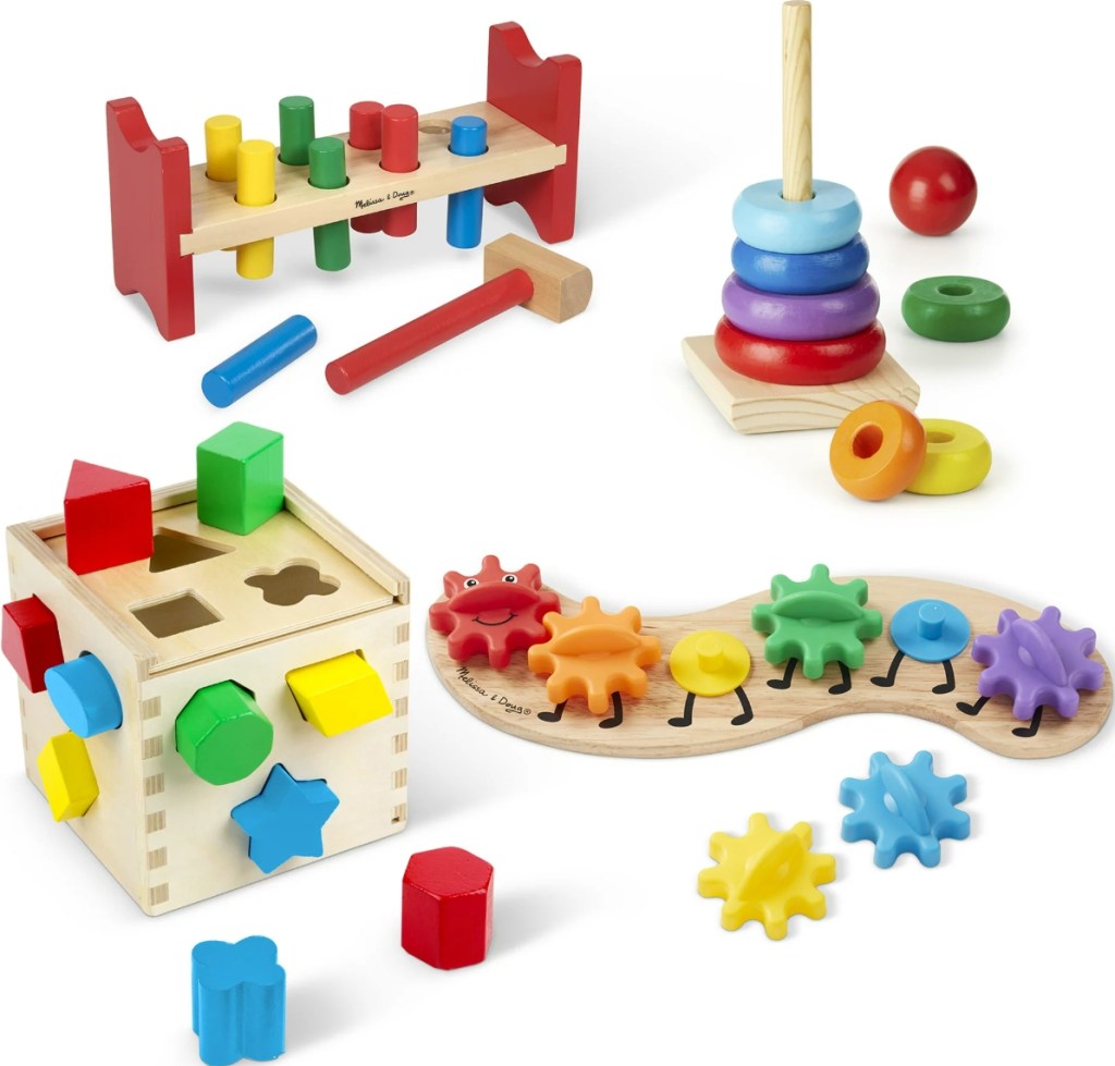 Four Melissa & Doug wooden toys including a shape sorter, stacker, gear caterpillar and workbench
