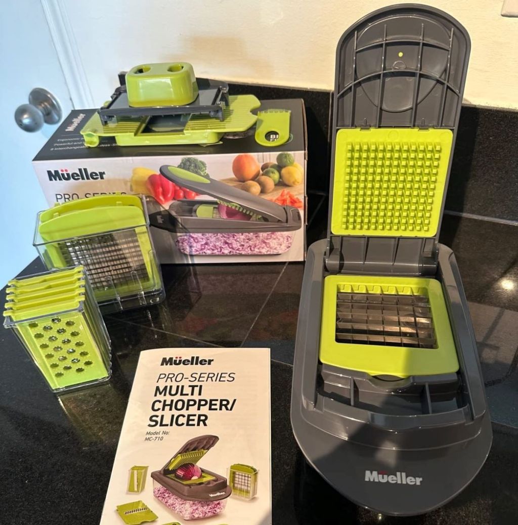 Green and grey vegetable chopper, accessories and box