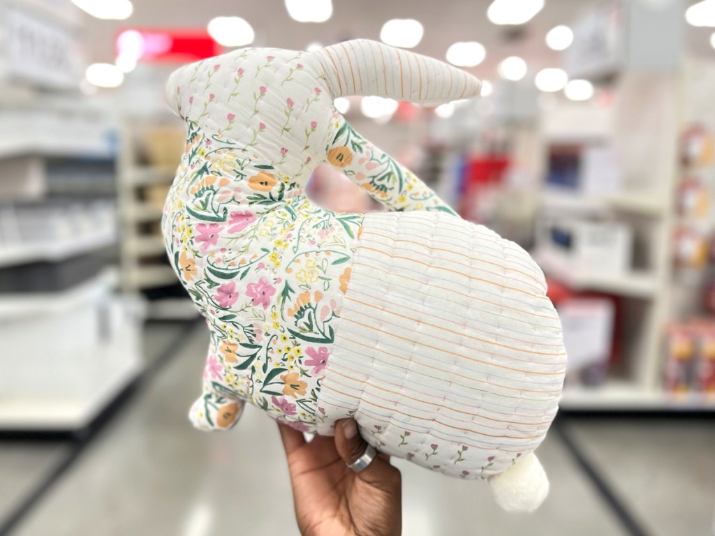 Patchwork Bunny Shaped Easter Throw Pillow being held by a woman in Target