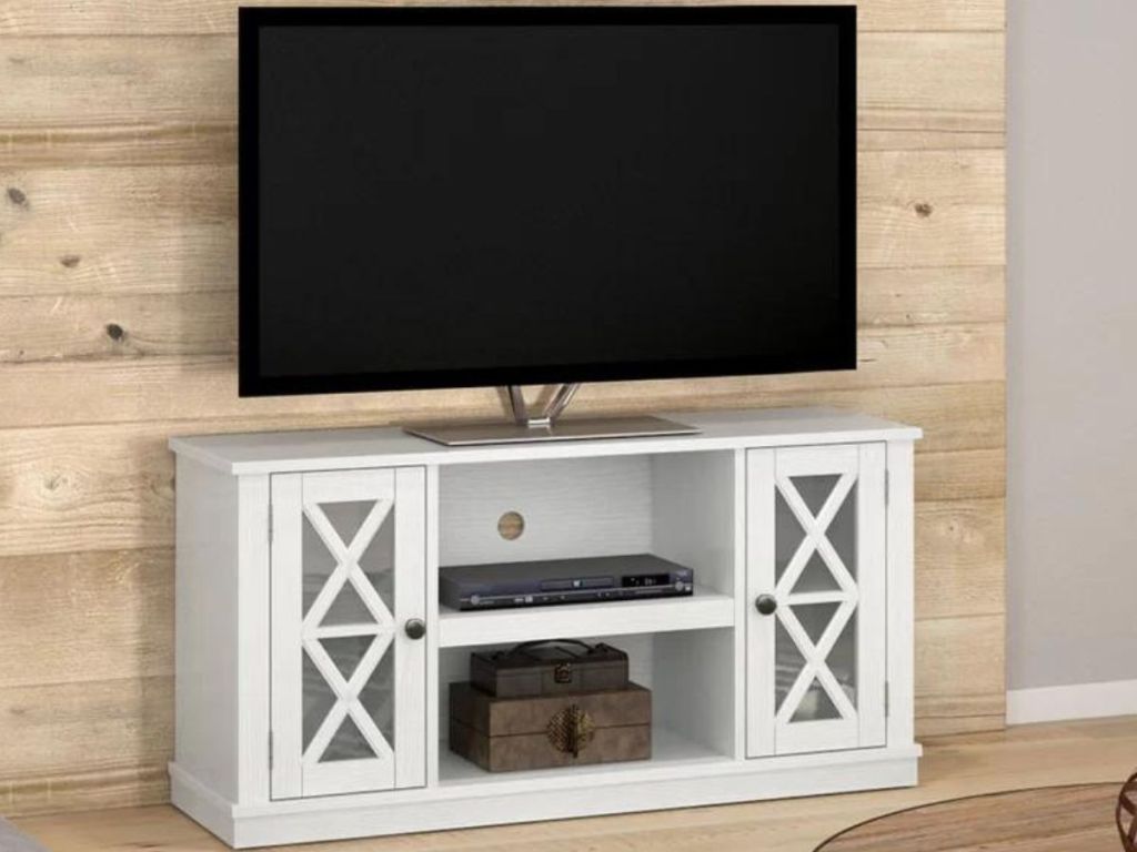 Stock image of Sand & Stable Alani Media Console with a tv on it