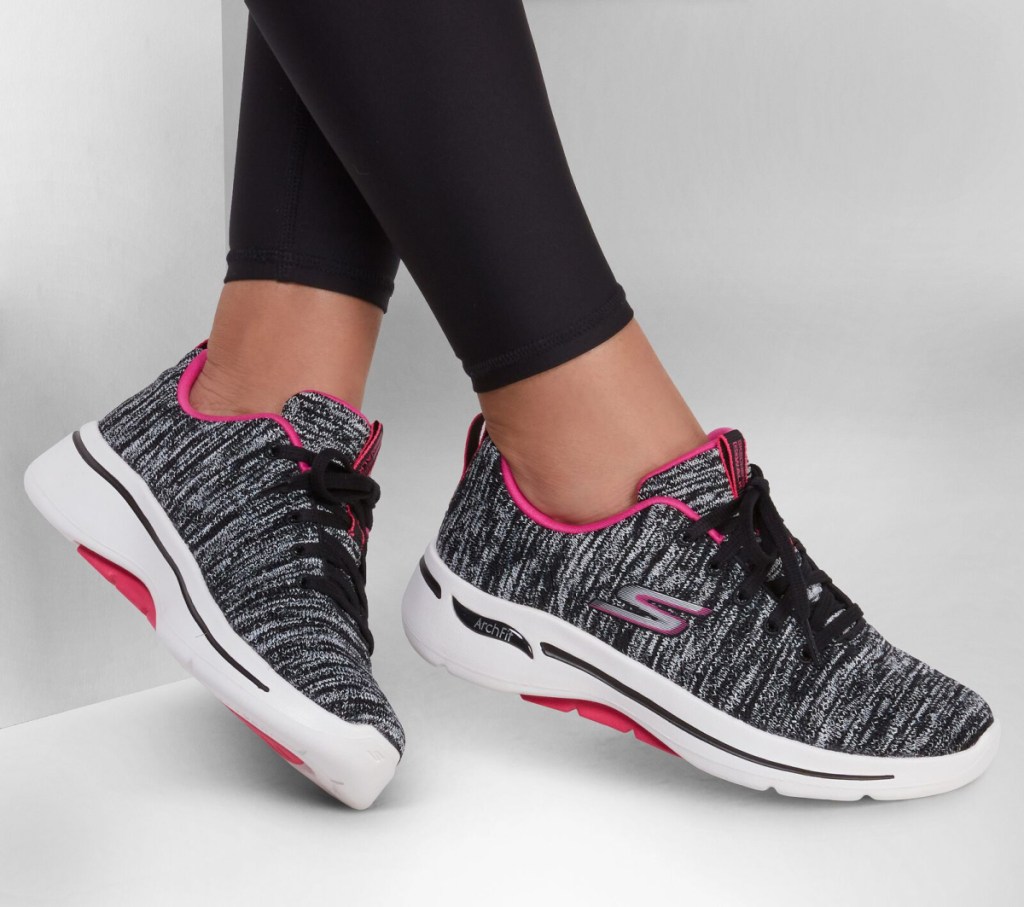 Woman wearing a pair of Sketchers Go Walk Arch Fit Walking Shoes for Women