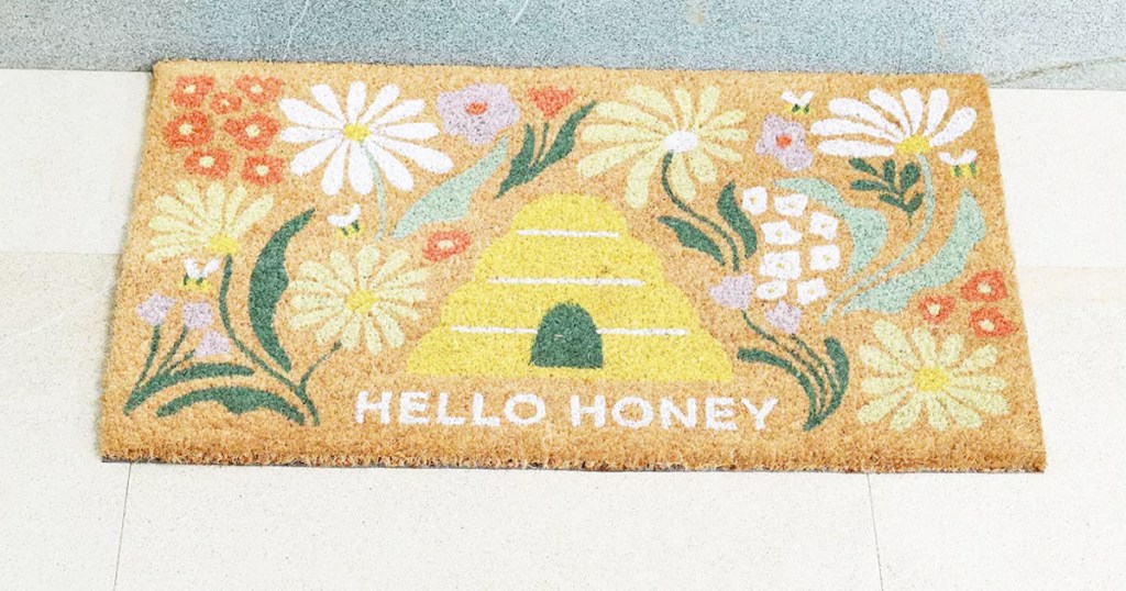 floral doormat with beehive that says hello honey