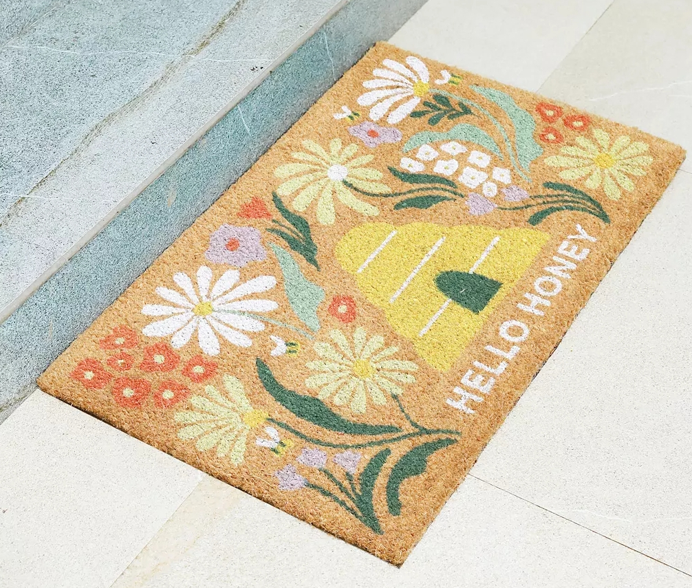 Doormat that says Hello Honey and has a beehive and flowers on it