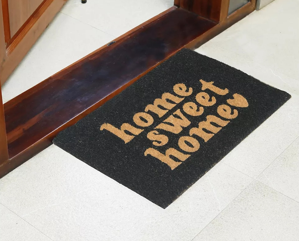 doormat that says home sweet home and has a heart on it