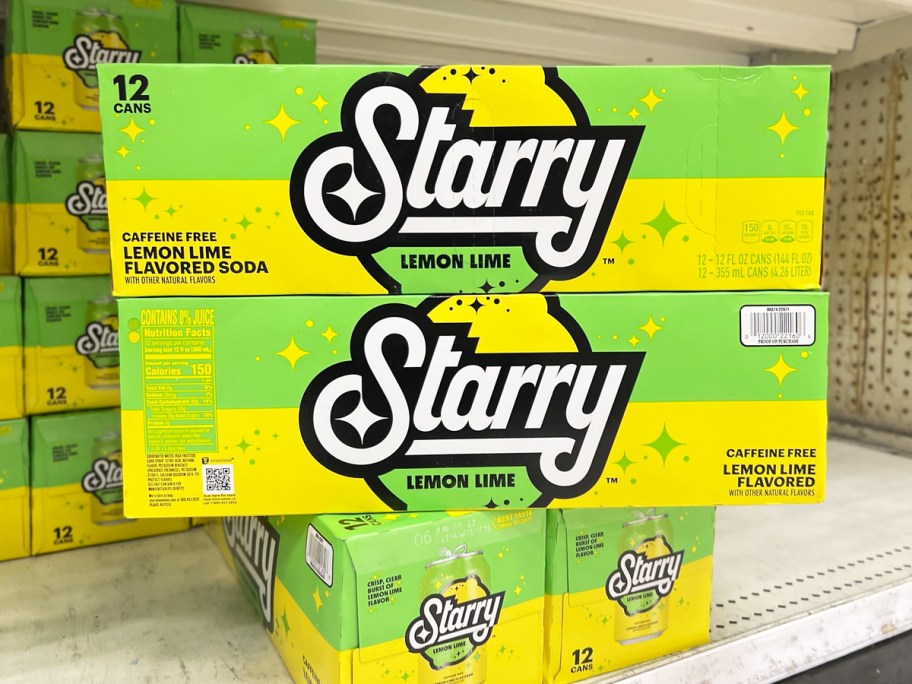 cases of Starry soda stacked on store shelf