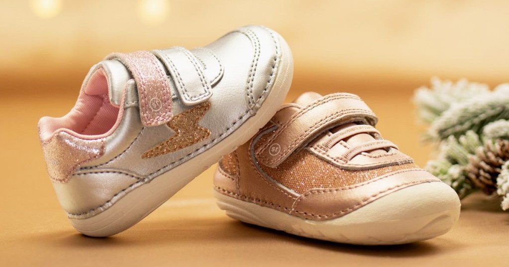 two stride rite sneakers with one on top of the other