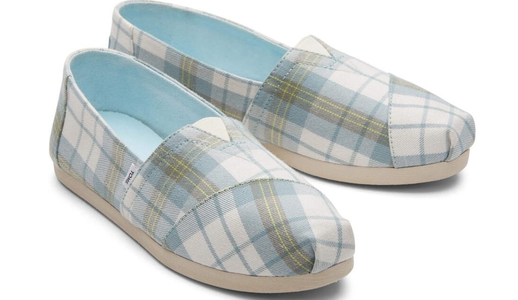 Pair of blue and grey plaid TOMS shoes
